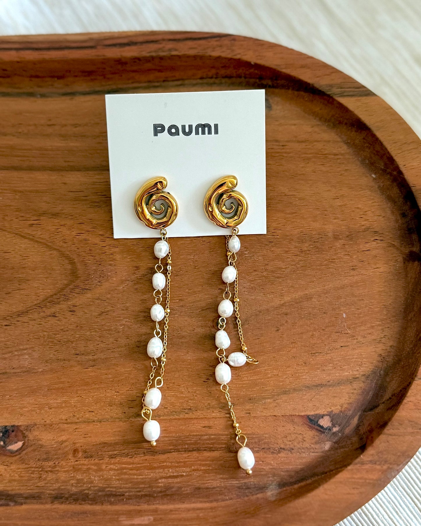 Pearly snail dangle earrings