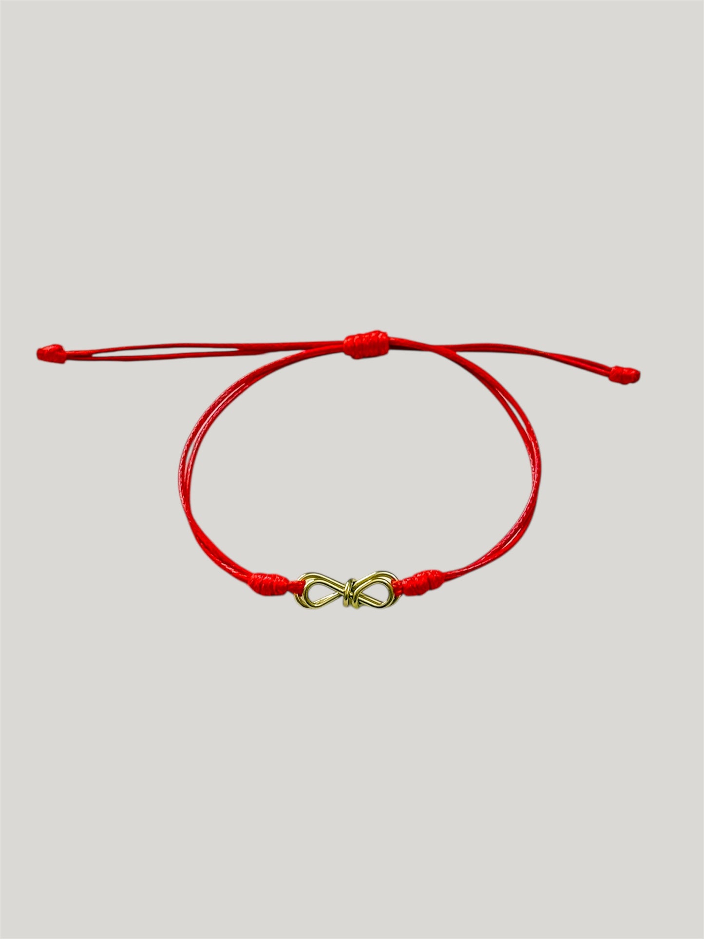 Double bow red cord bracelet