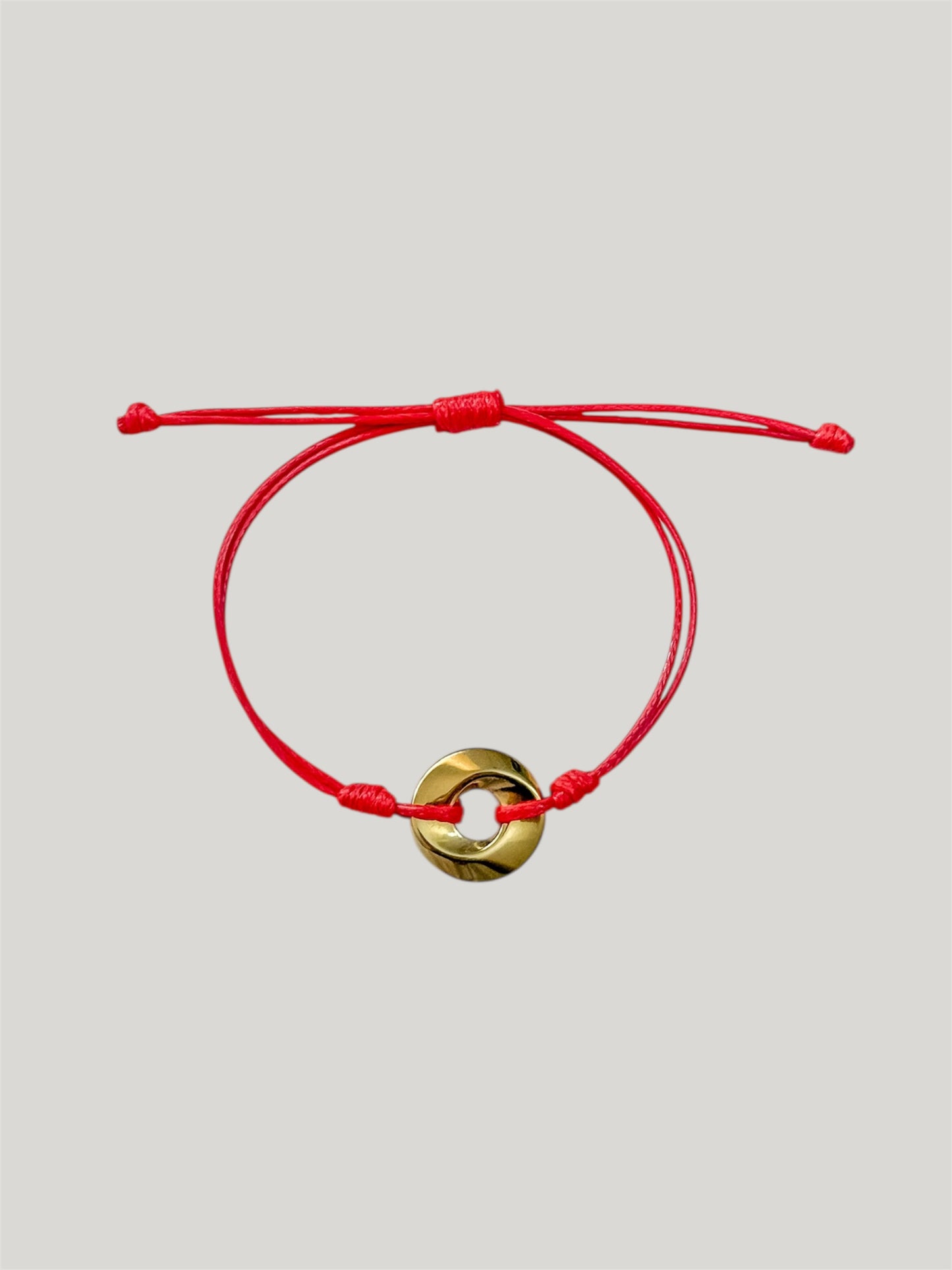 Round spiral red cord bracelet