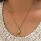 Golden ladybug necklace