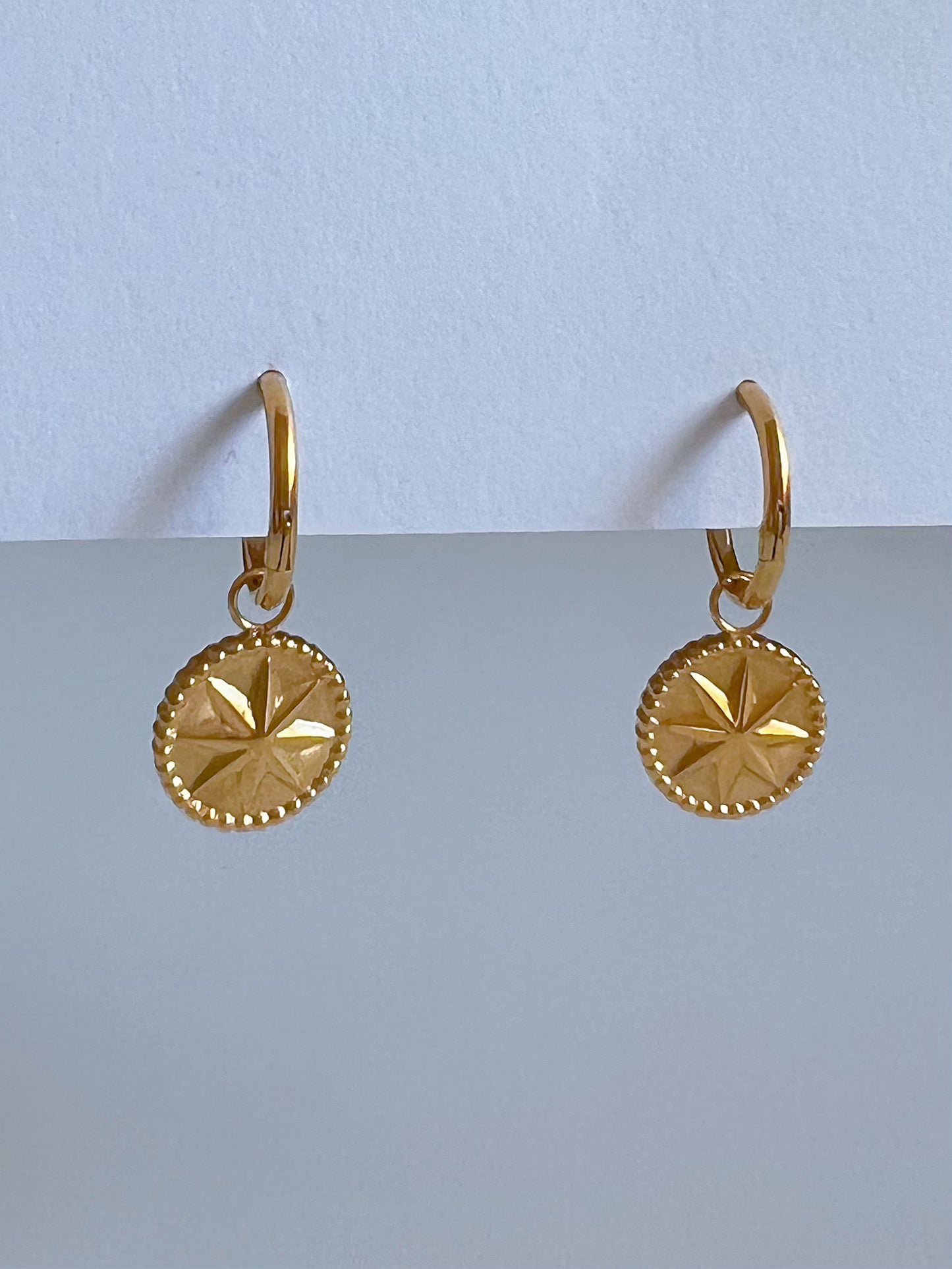 Eight Point Star Huggies Earrings