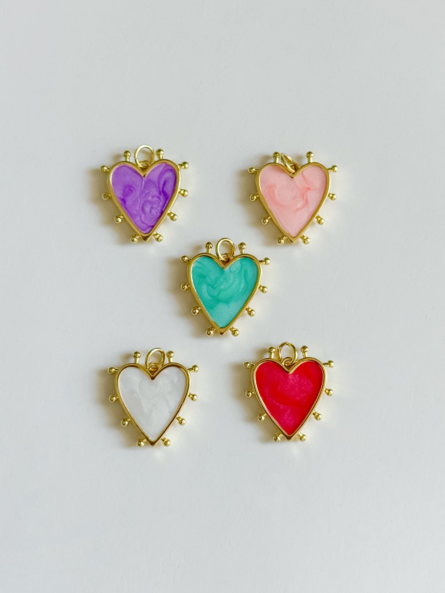 Enamel pointed heart charm
