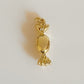 Golden candy charm