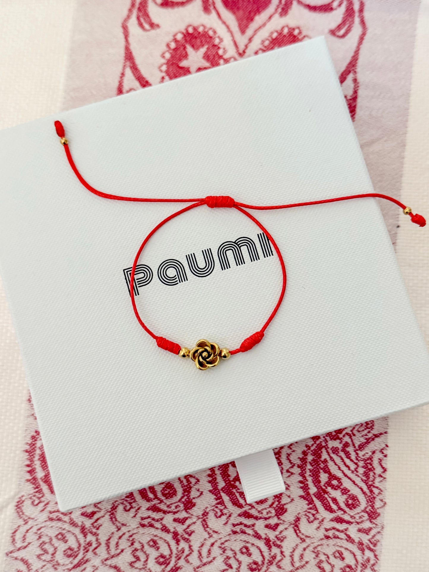 Rosette cord bracelet