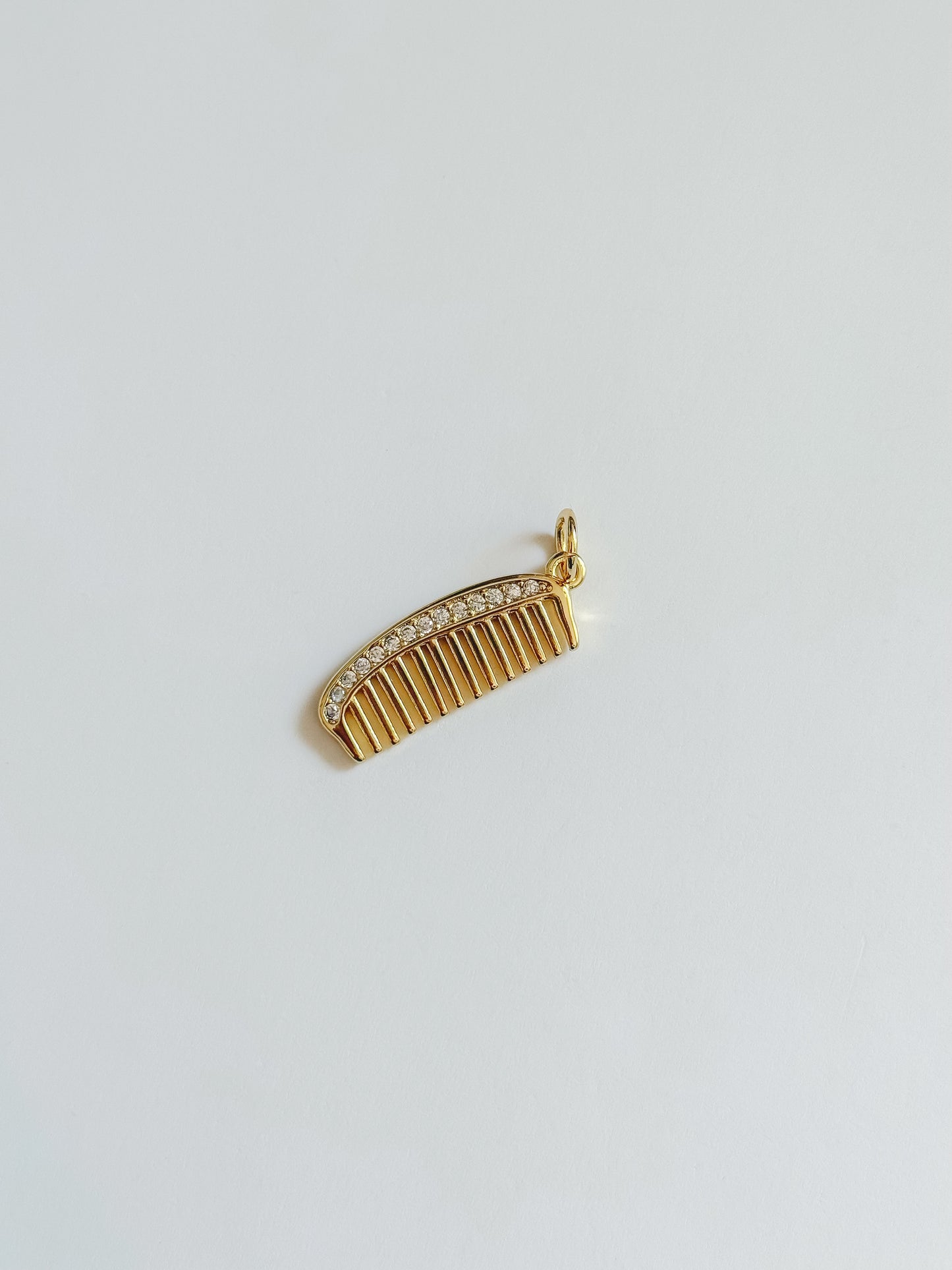 Comb charm