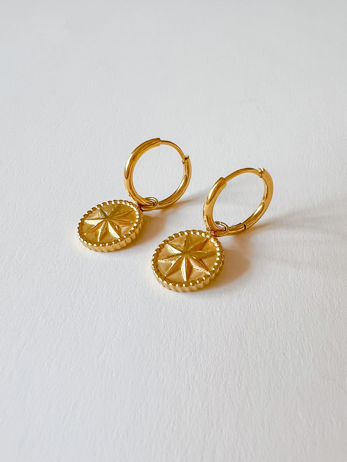 Eight Point Star Huggies Earrings