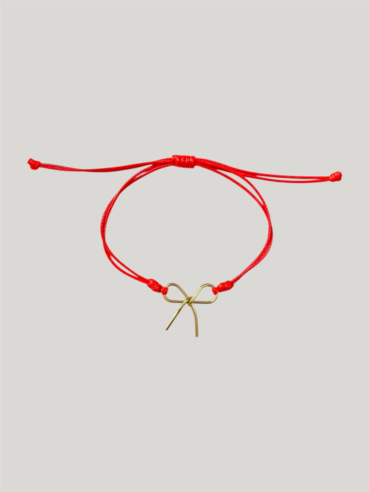 Bow red cord bracelet