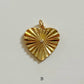 Sunburst heart charm