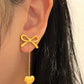 Bow and heart earrings