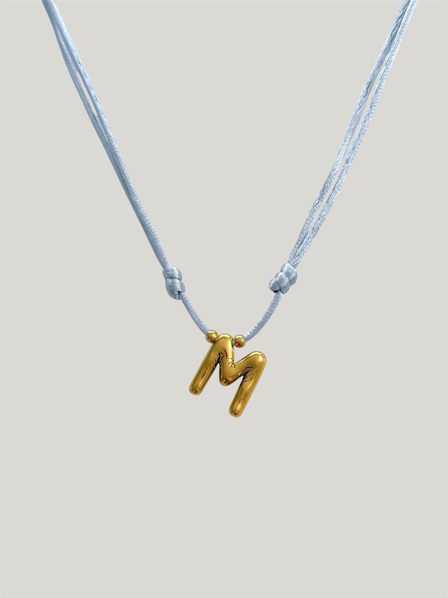 Balloon initial cord necklace